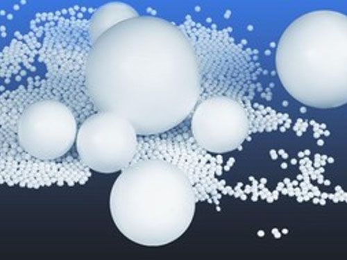 Mill balls with nano zirconium additive